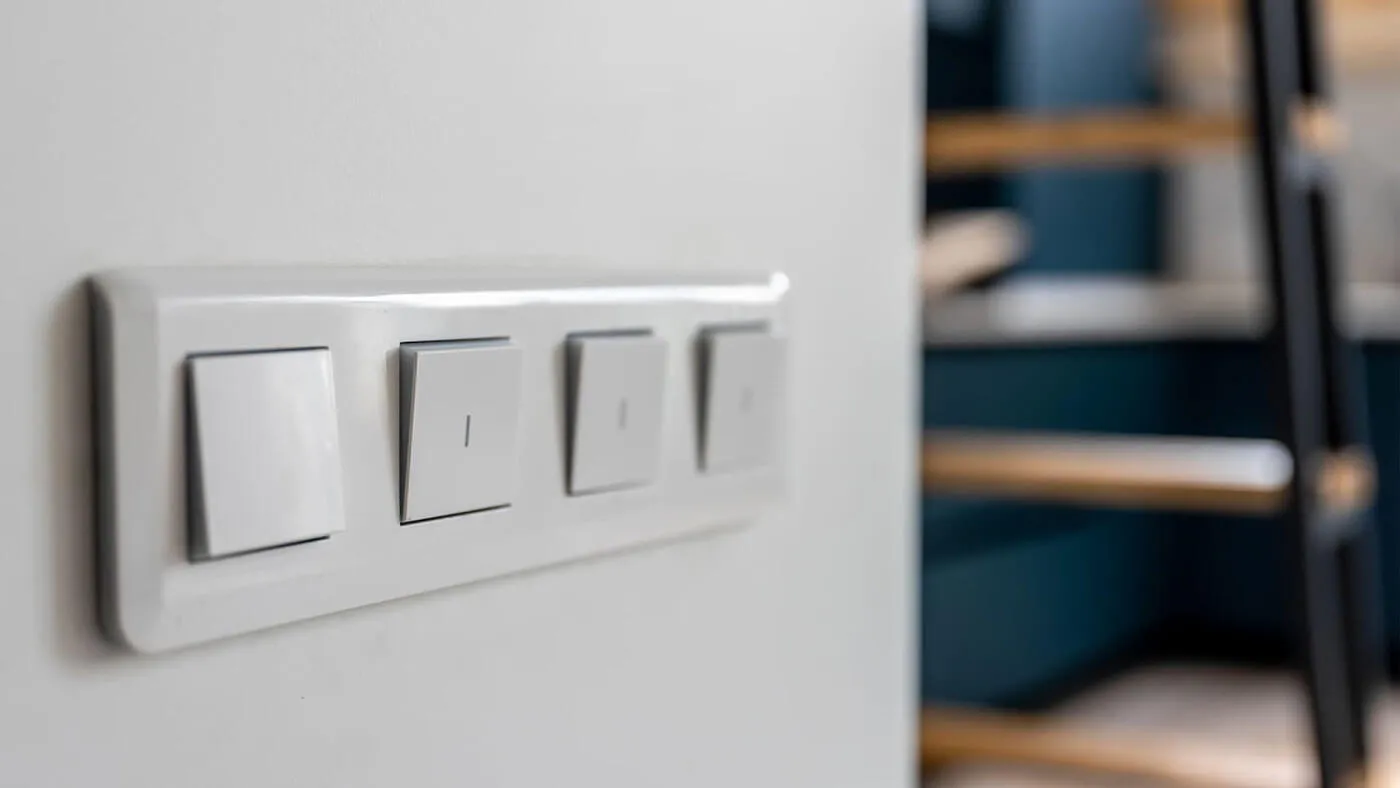 The same wall with the wiring made safe behind a new switch plate